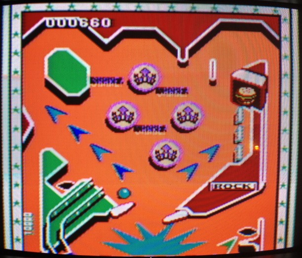 Here's the upper level of the Rock 'n Ball playfield. Note the drop targets and the hamburger bonus on the right.